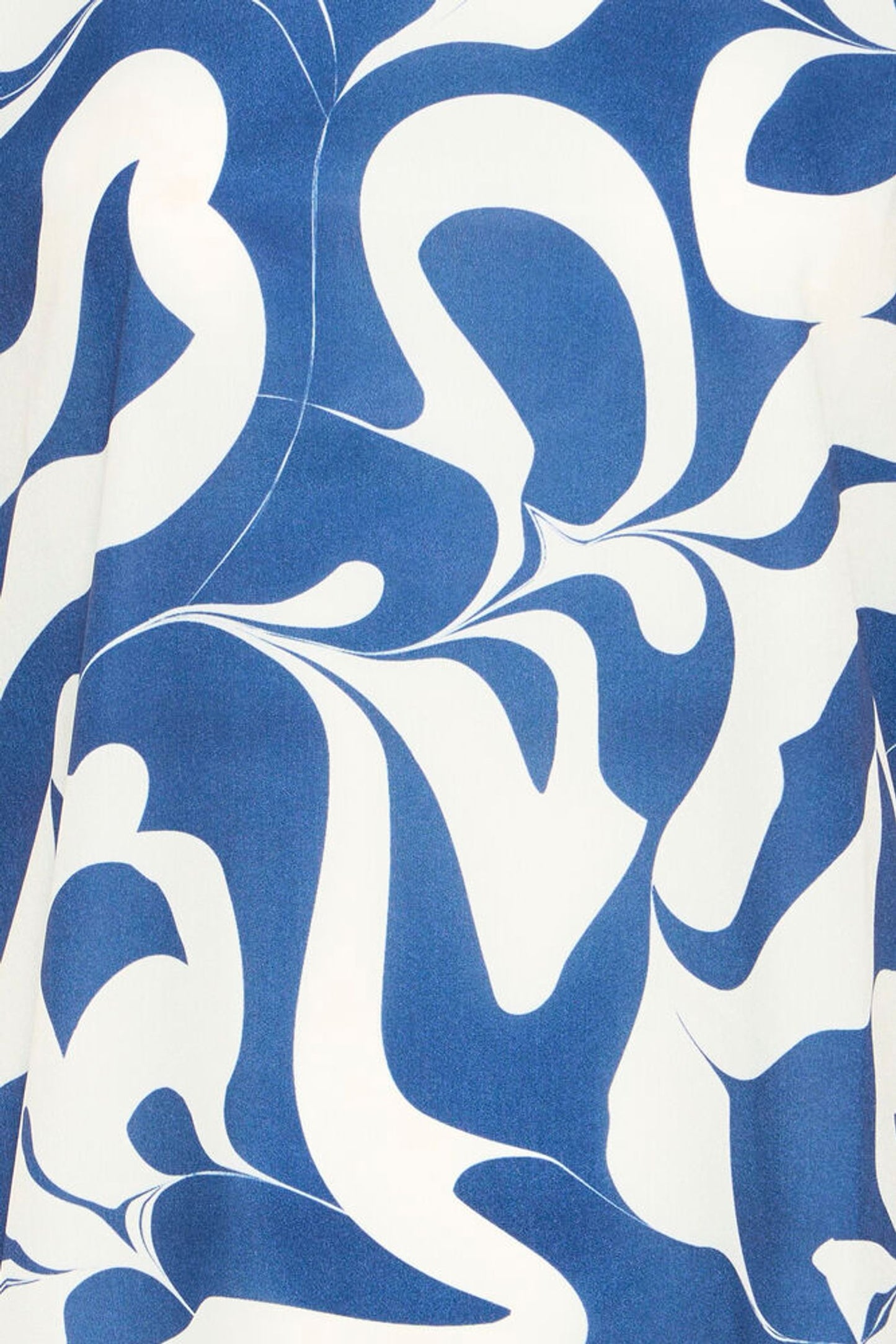 Close-up of blue and white abstract patterned fabric