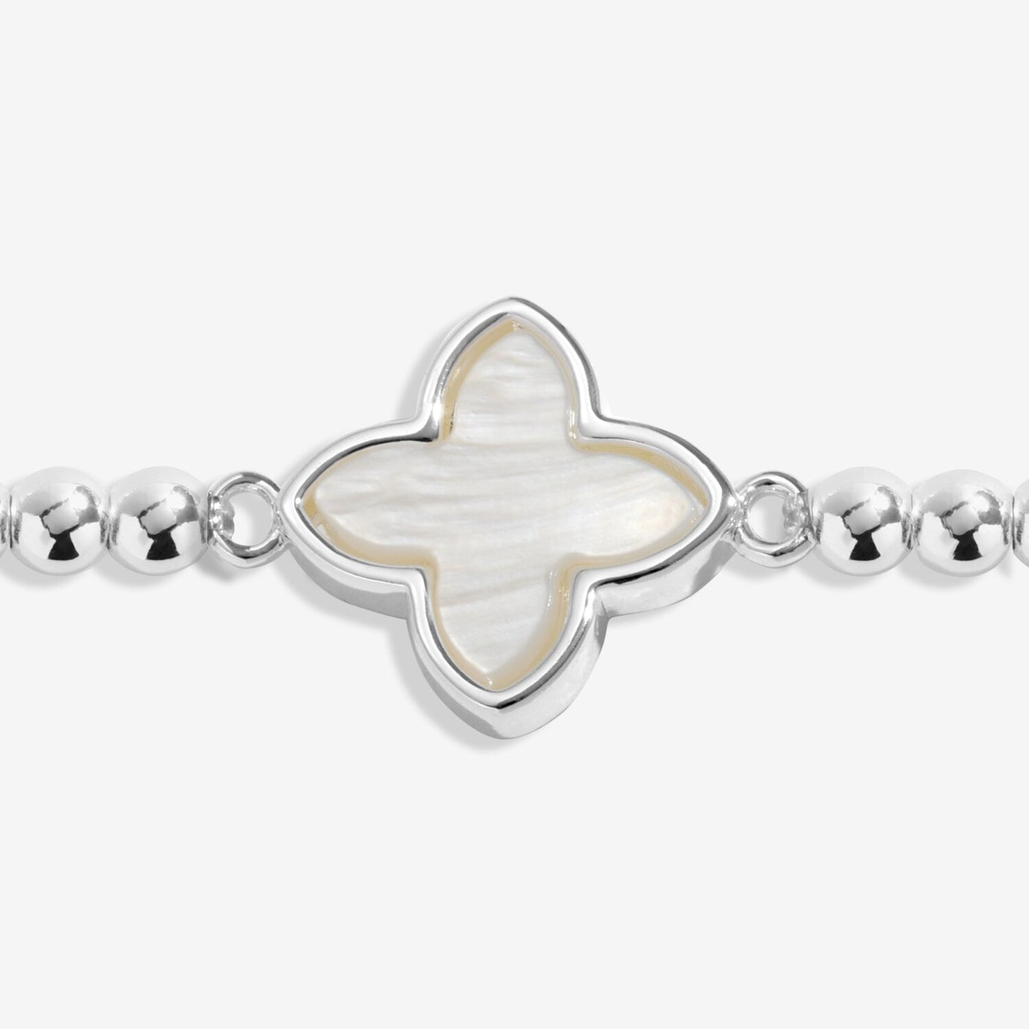 Silver bracelet with a butterfly-shaped charm on a white background