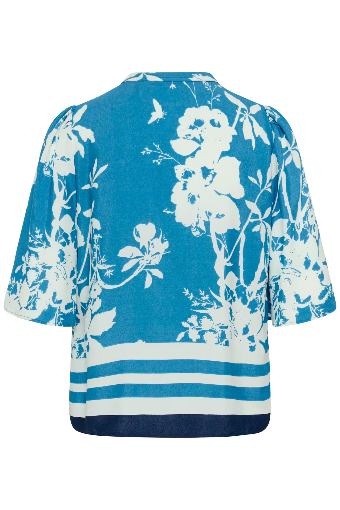 Blue top with white floral pattern on a white background