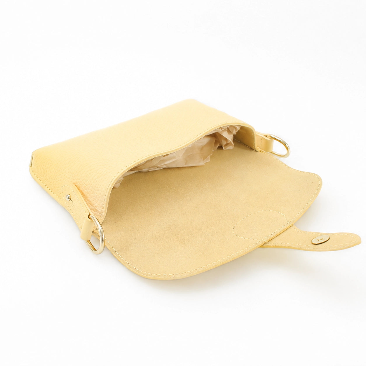 Yellow handbag with a strap on a white background