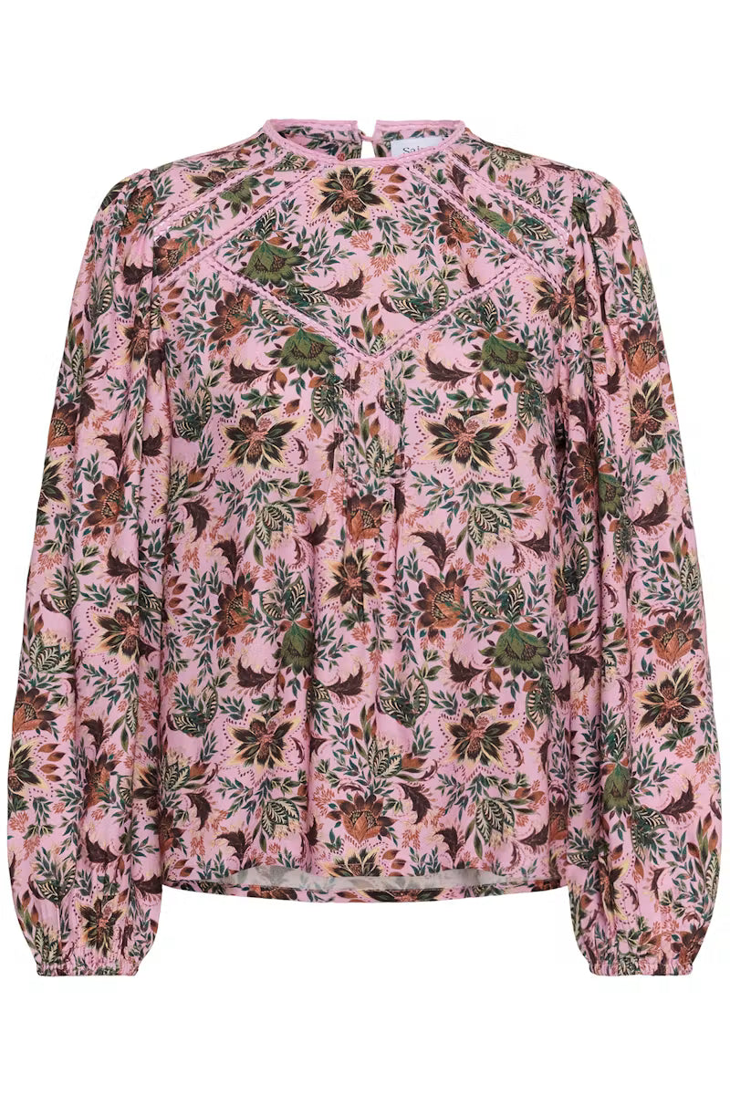 Floral patterned blouse on a white background