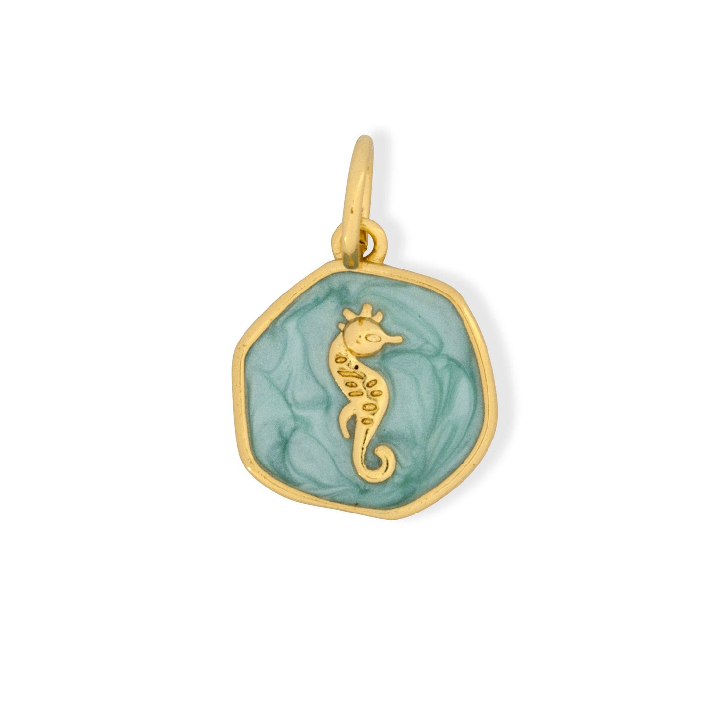 Gold and green seahorse pendant on a white background