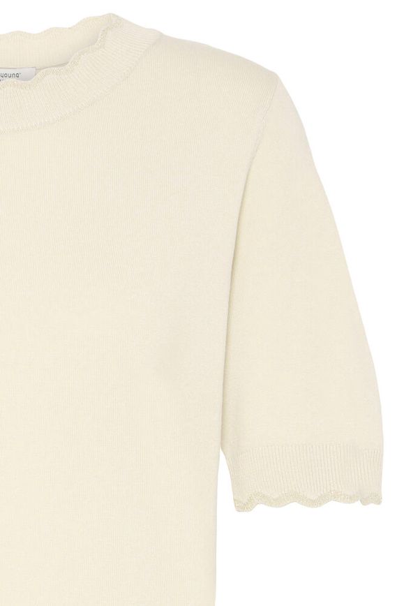 Cream-colored sweater on a white background
