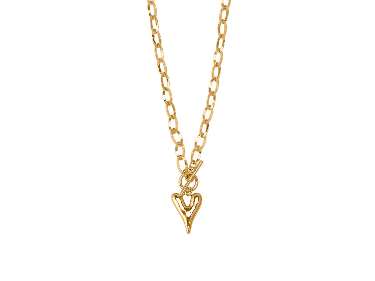 Gold necklace with a heart-shaped pendant on a white background