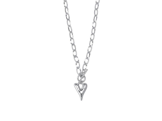 Silver heart-shaped pendant on a chain against a white background