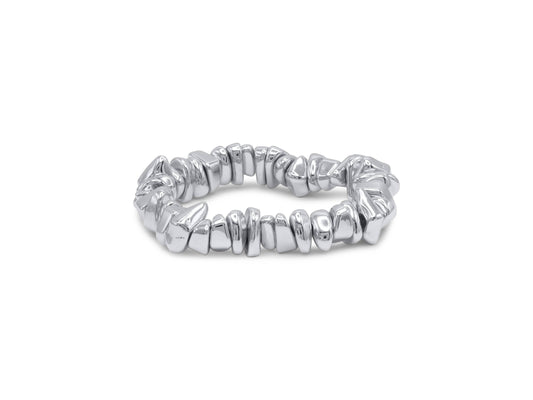Silver bracelet with a textured band on a white background