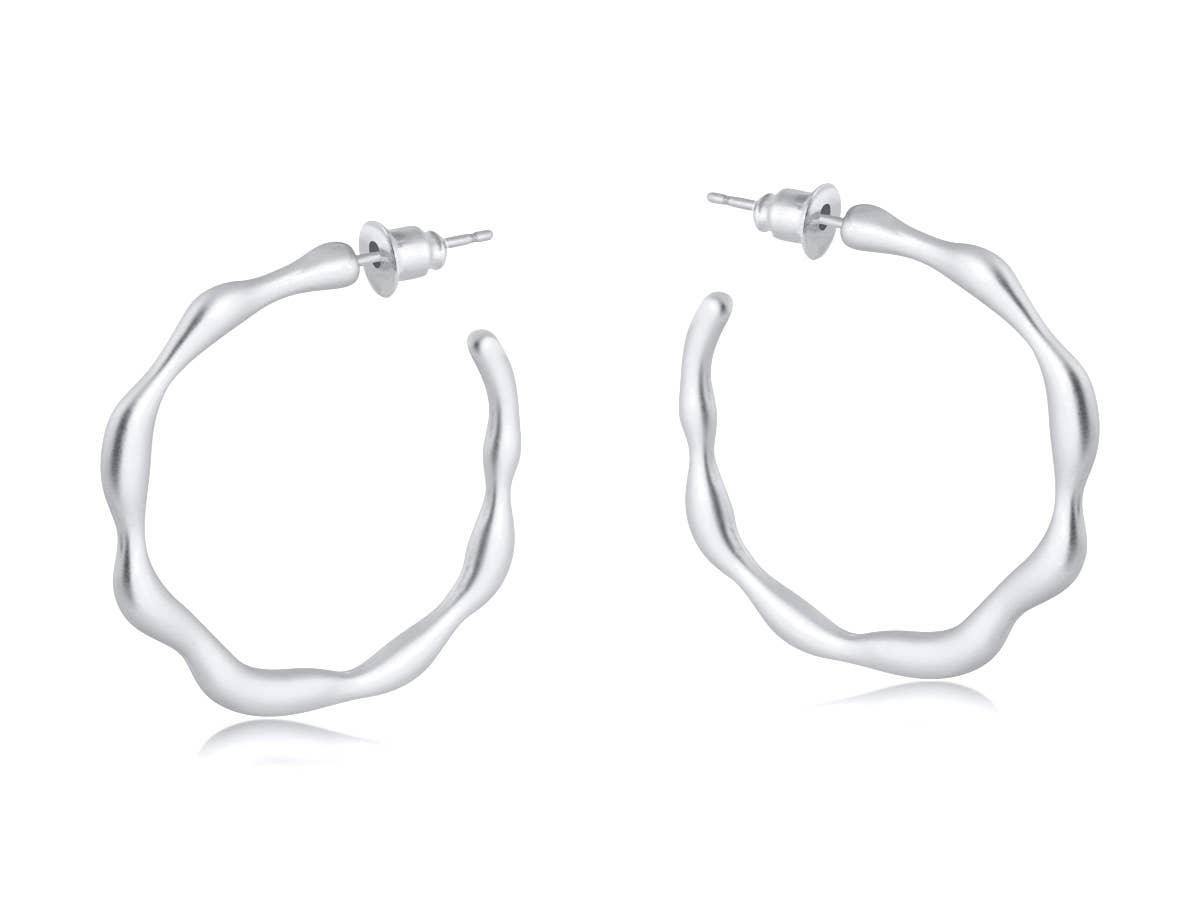 Silver hoop earrings on a white background