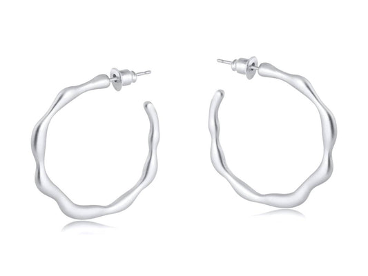Silver hoop earrings on a white background