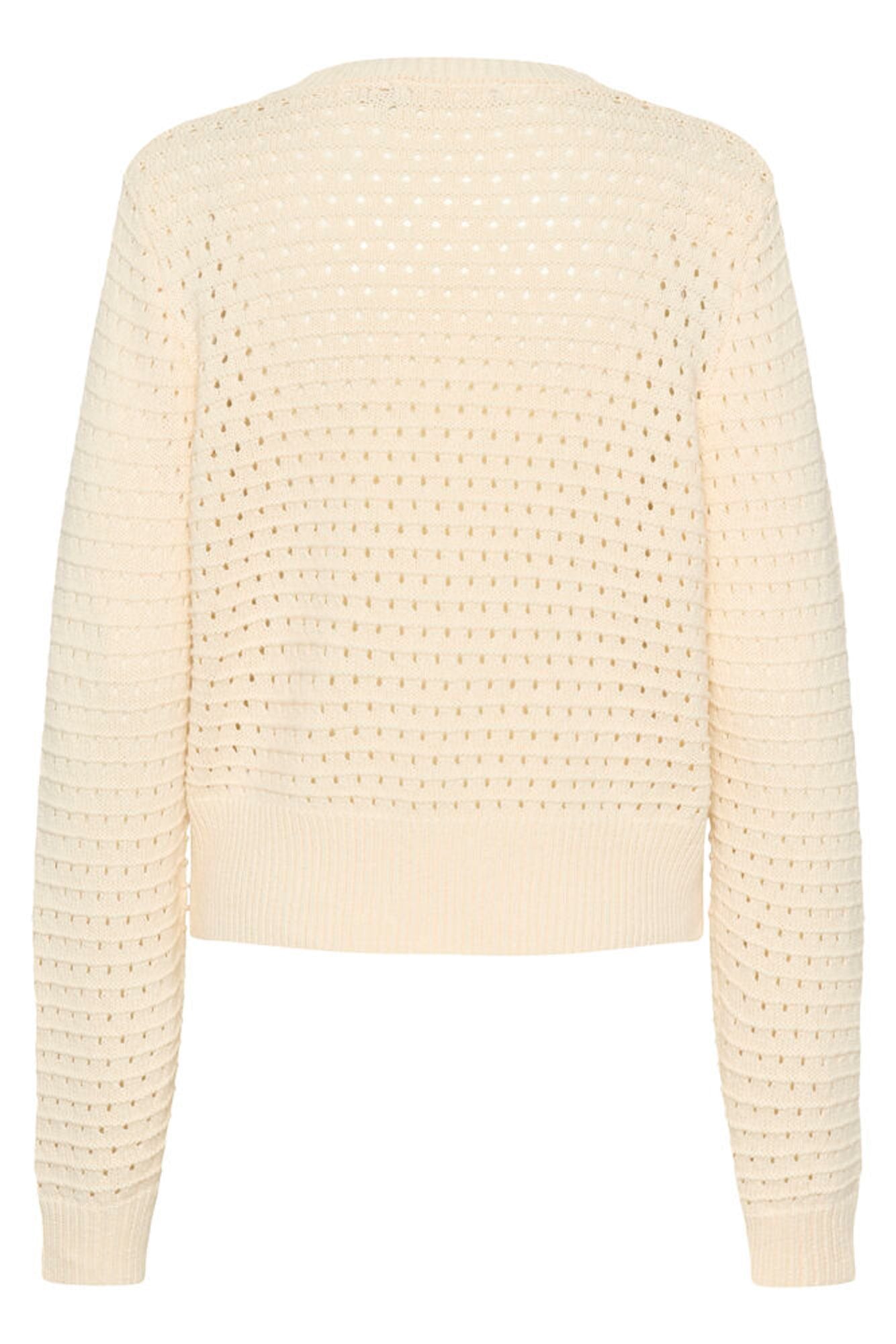 Beige knitted sweater on a white background