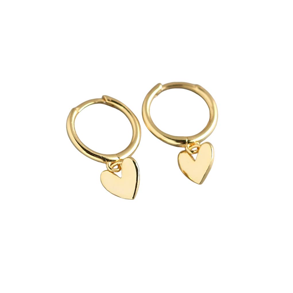 Gold hoop earrings with heart charms on a white background
