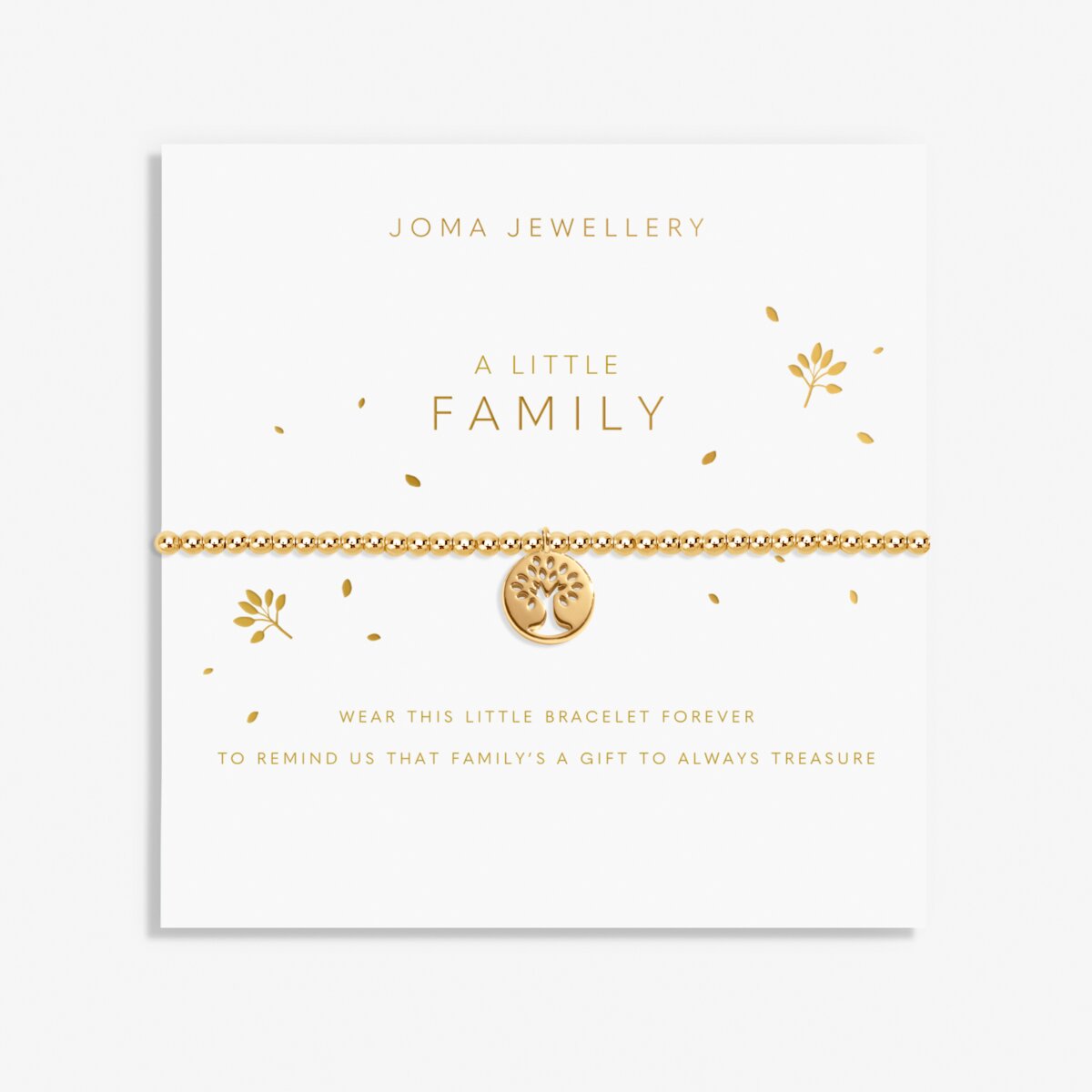 Gold bracelet with tree of life charm on a Joma Jewellery card.