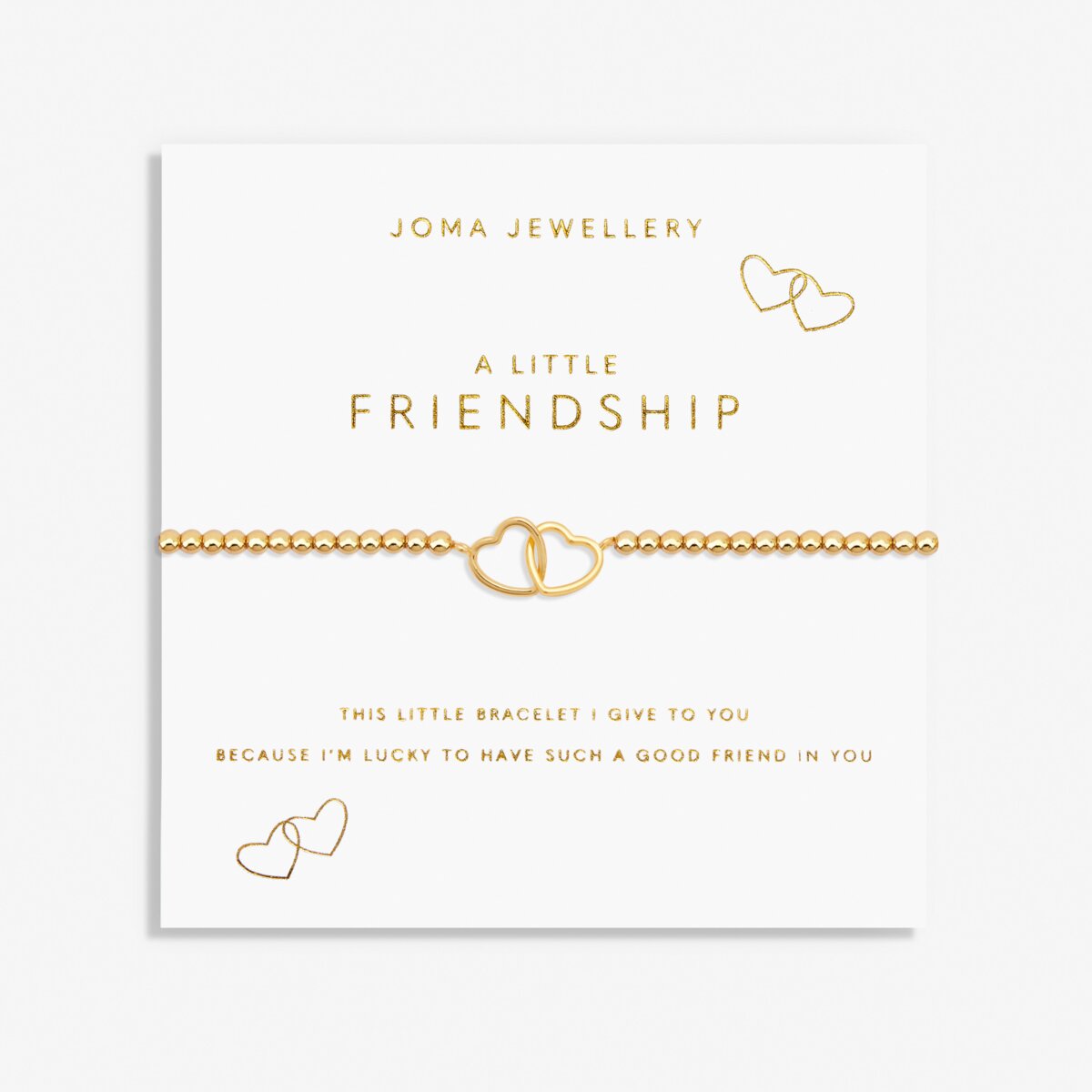Gold bracelet with interlocking hearts on a Joma Jewellery card.