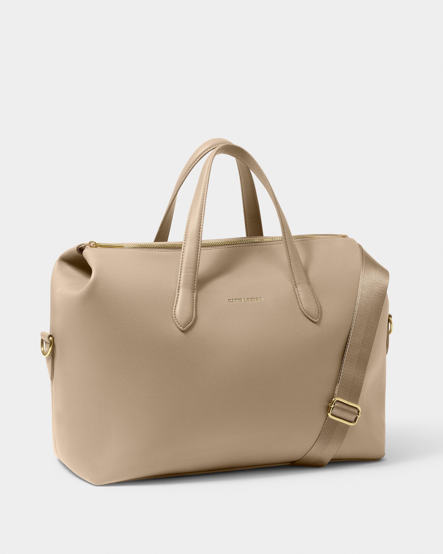 Beige handbag with a shoulder strap on a light gray background