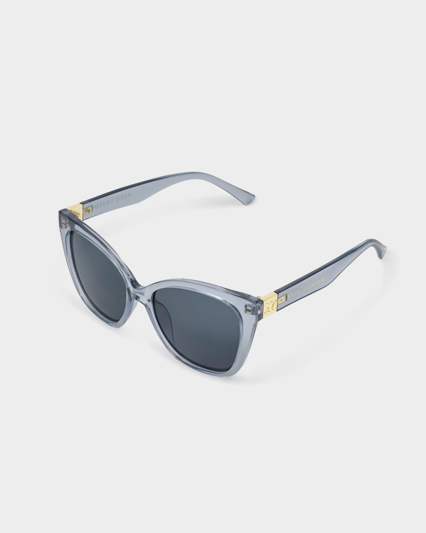 Katie Loxton | Mykonos Oversized Cat-Eye Sunglasses | Blue Transparent