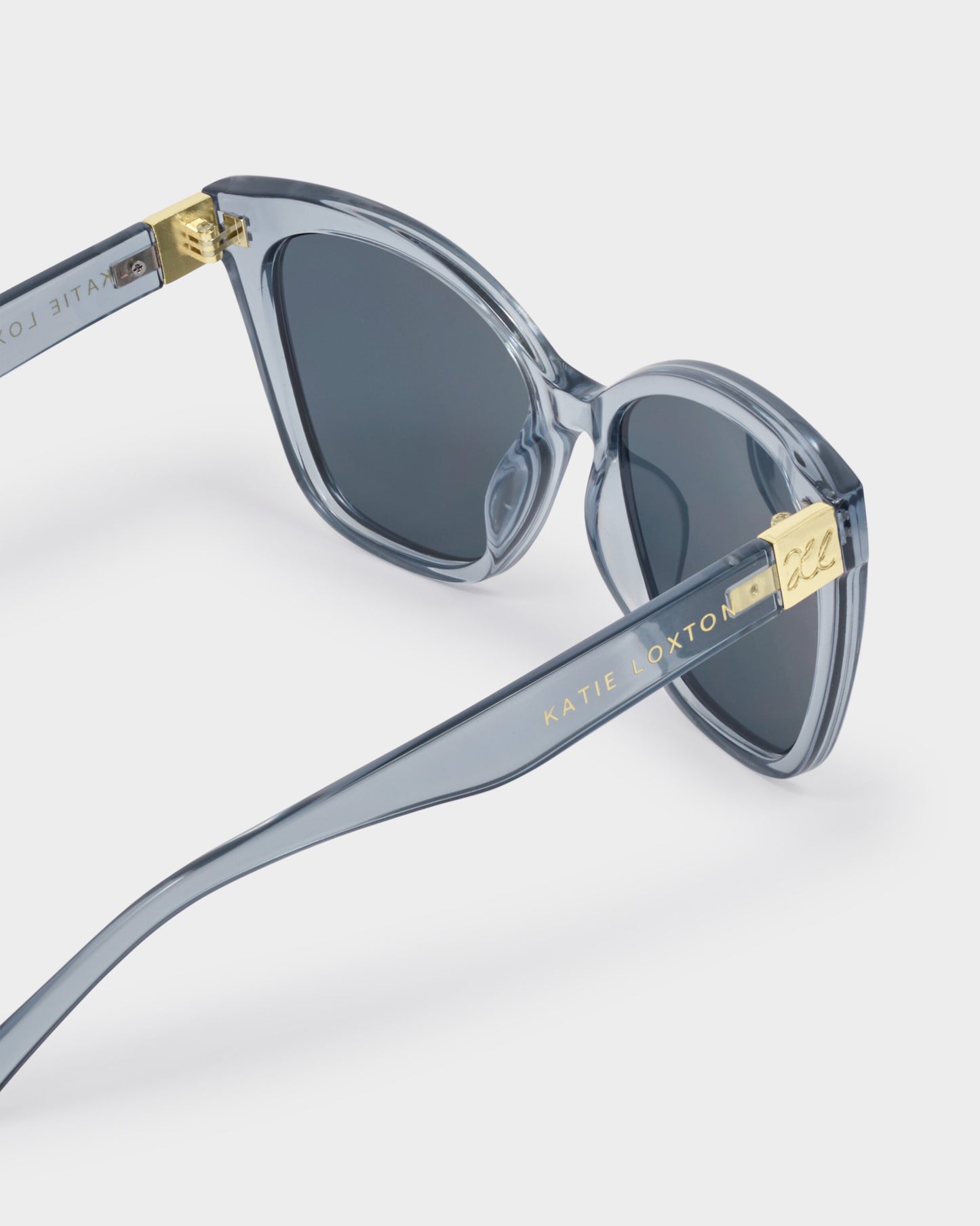 Katie Loxton | Mykonos Oversized Cat-Eye Sunglasses | Blue Transparent