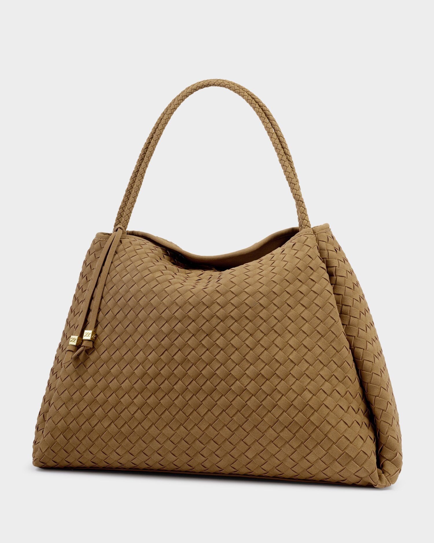 Brown woven handbag on a light gray background