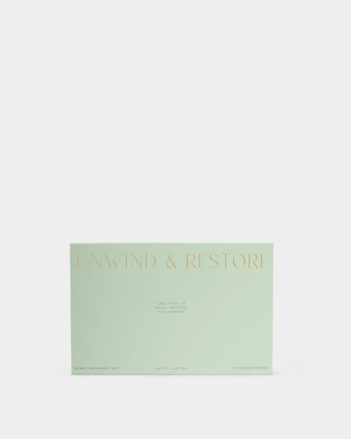 Product packaging with 'Unwind & Restore' text on a light green background