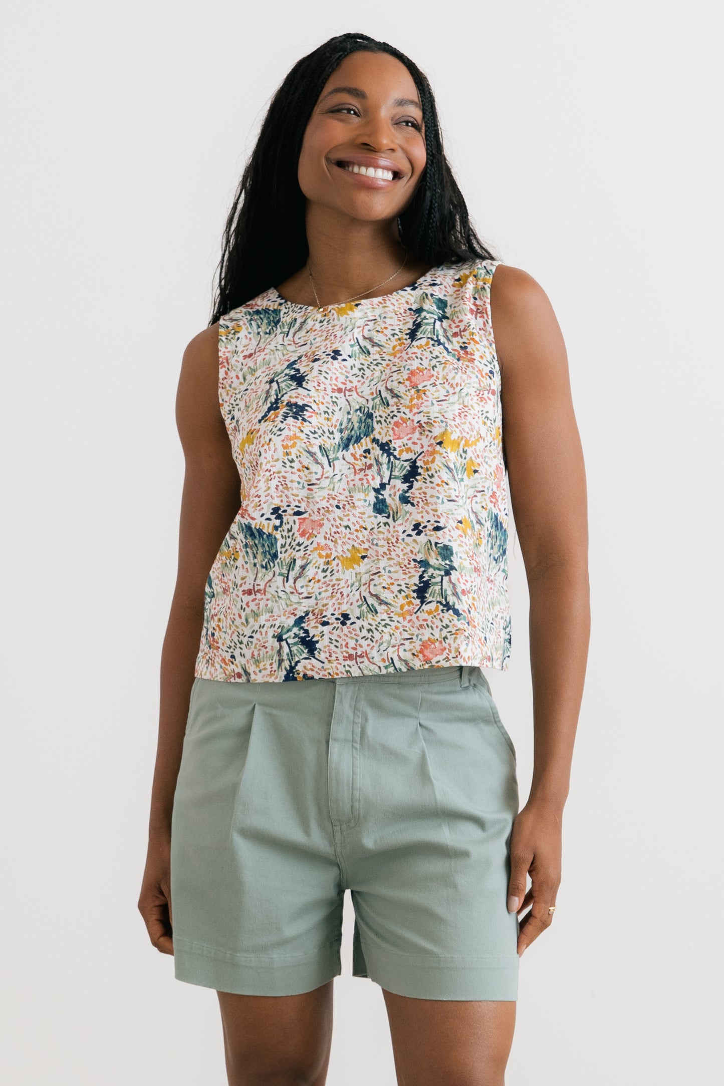 Women wearing floral vest top with shorts