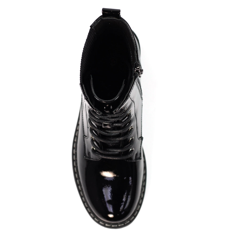 Black glossy boot on a white background