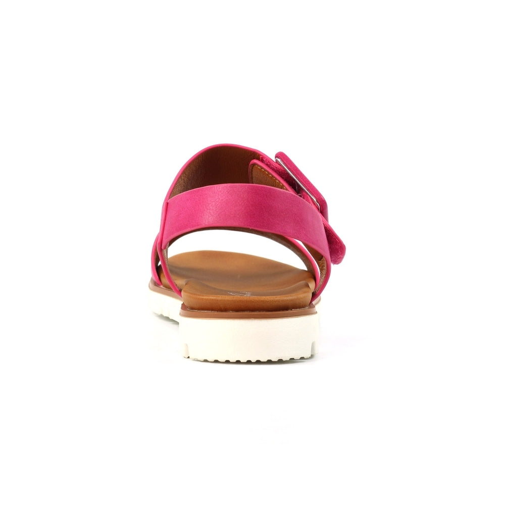 Pink sandal with a white sole on a white background