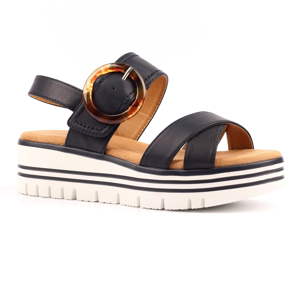 Navy Blue sandal with a thick sole on a white background