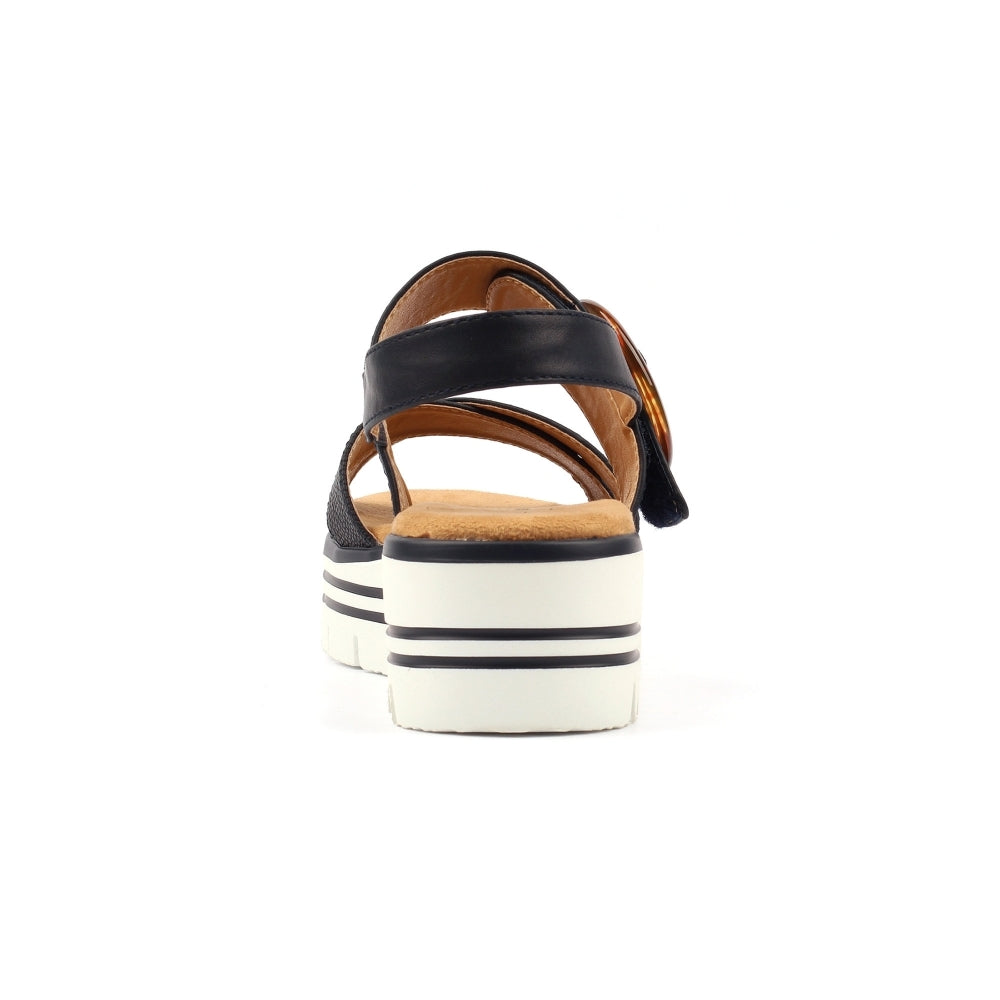 Navy sandal with white sole on a white background