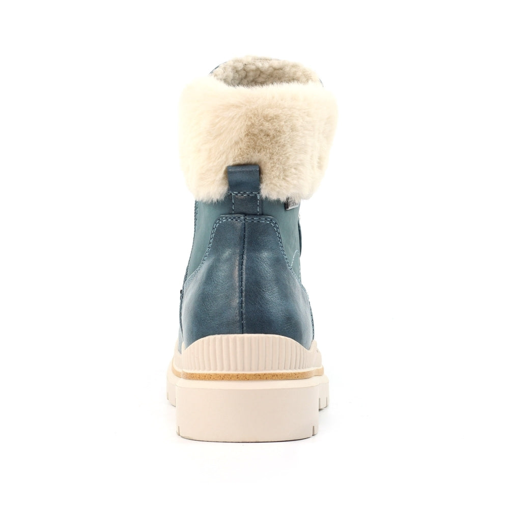 Blue winter boot with white fur lining on a white background