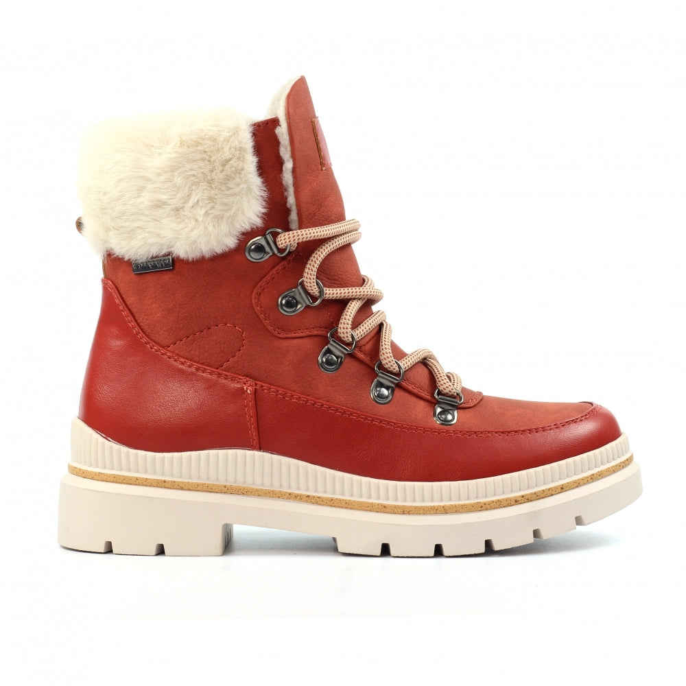Orange winter boot with white fur lining on a white background