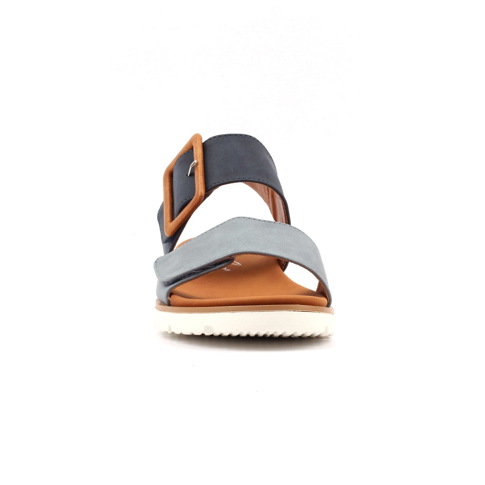 Multicolored sandal with gray, brown, and black straps on a white background