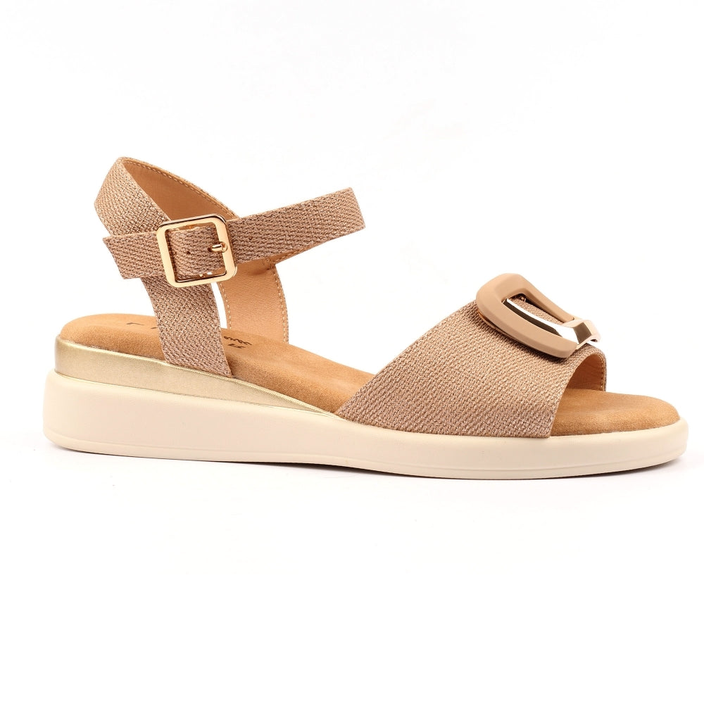 Beige sandal with a strap and buckle on a white background