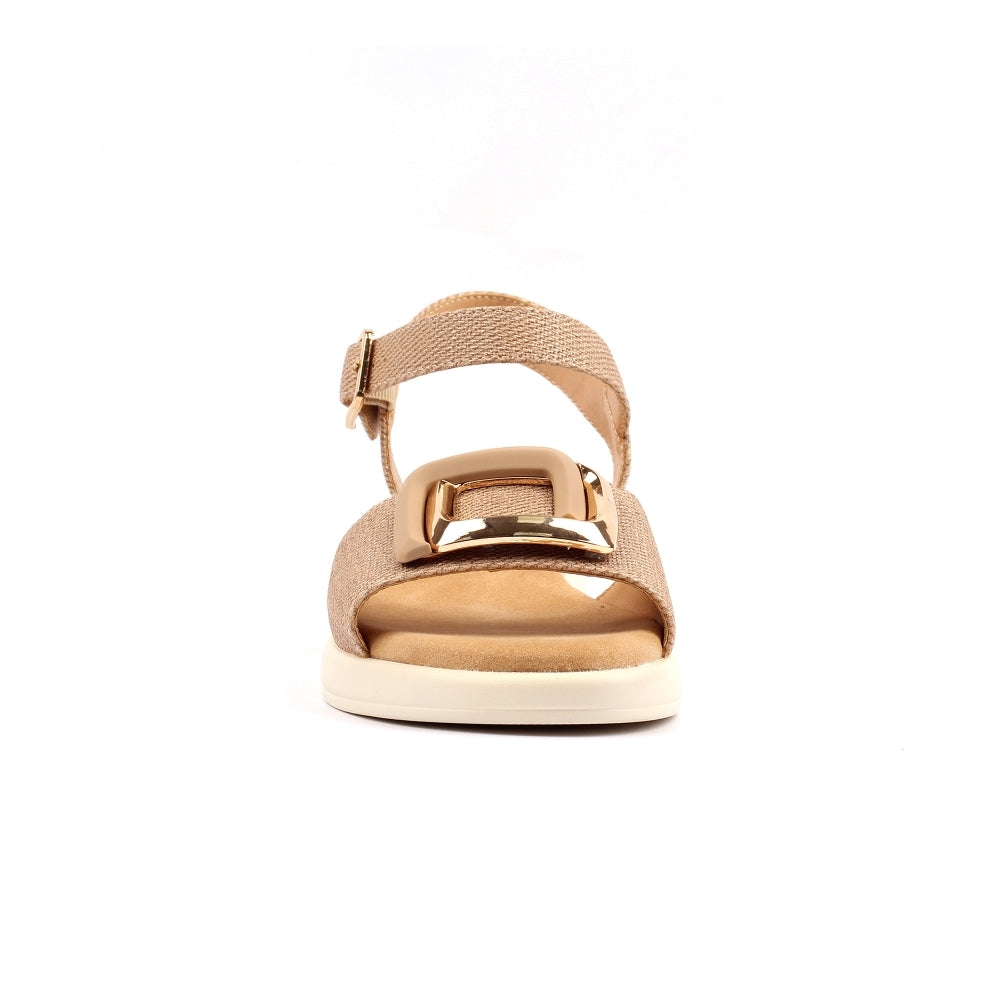 Beige sandal with a gold buckle on a white background