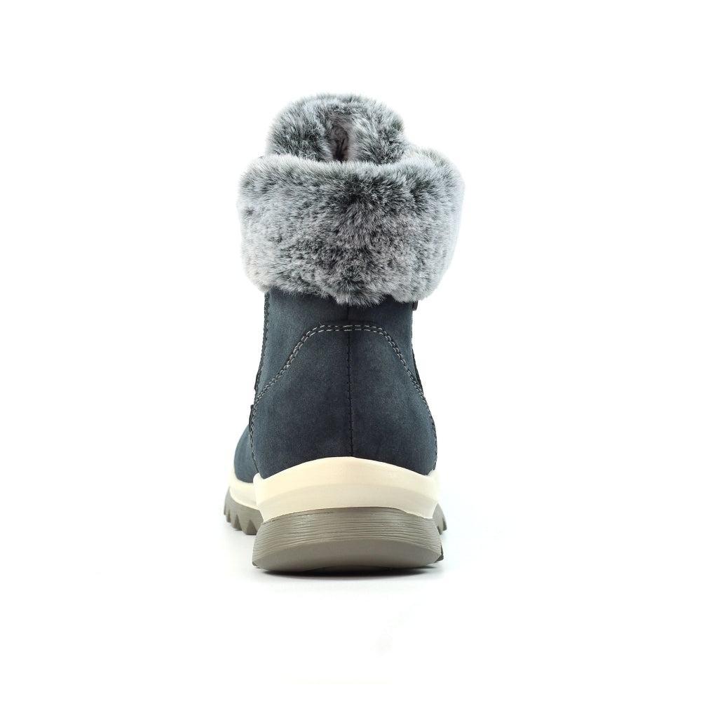 Blue winter boot with fur trim on a white background