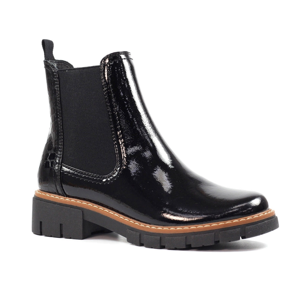 Black patent leather Chelsea boot on a white background