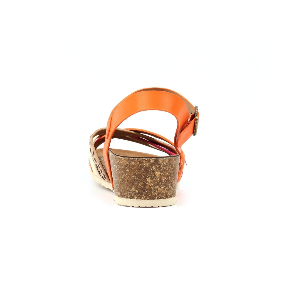 Orange sandal with cork sole on a white background