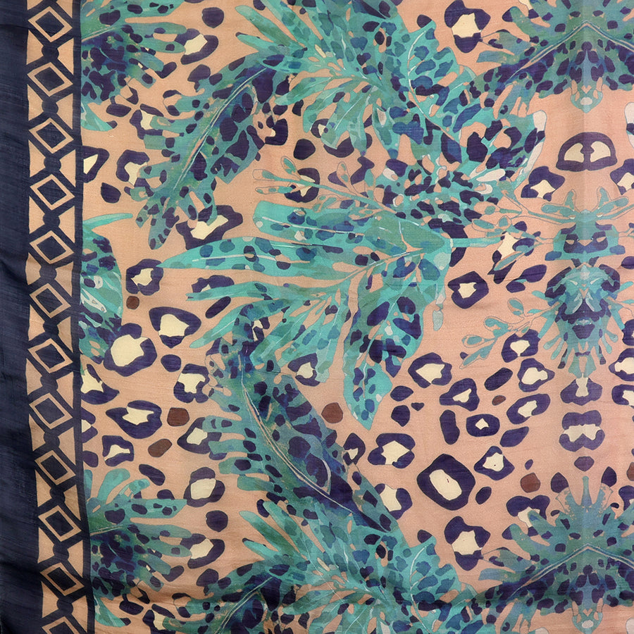 Scarf with leopard print and tropical leaf pattern on a pink background