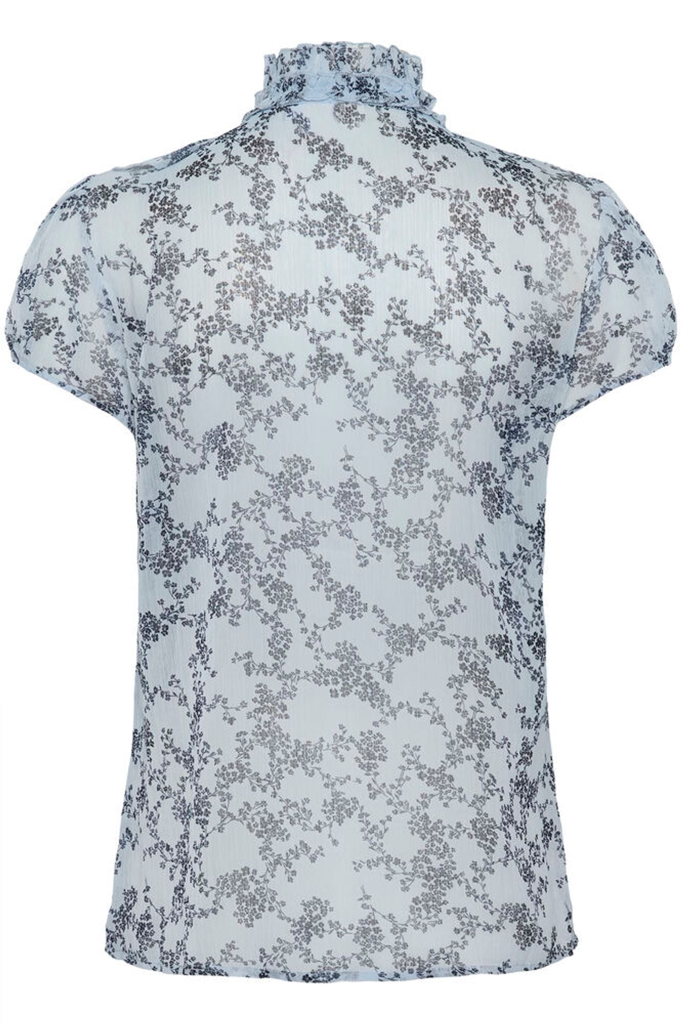Back view of a floral-patterned blouse on a white background