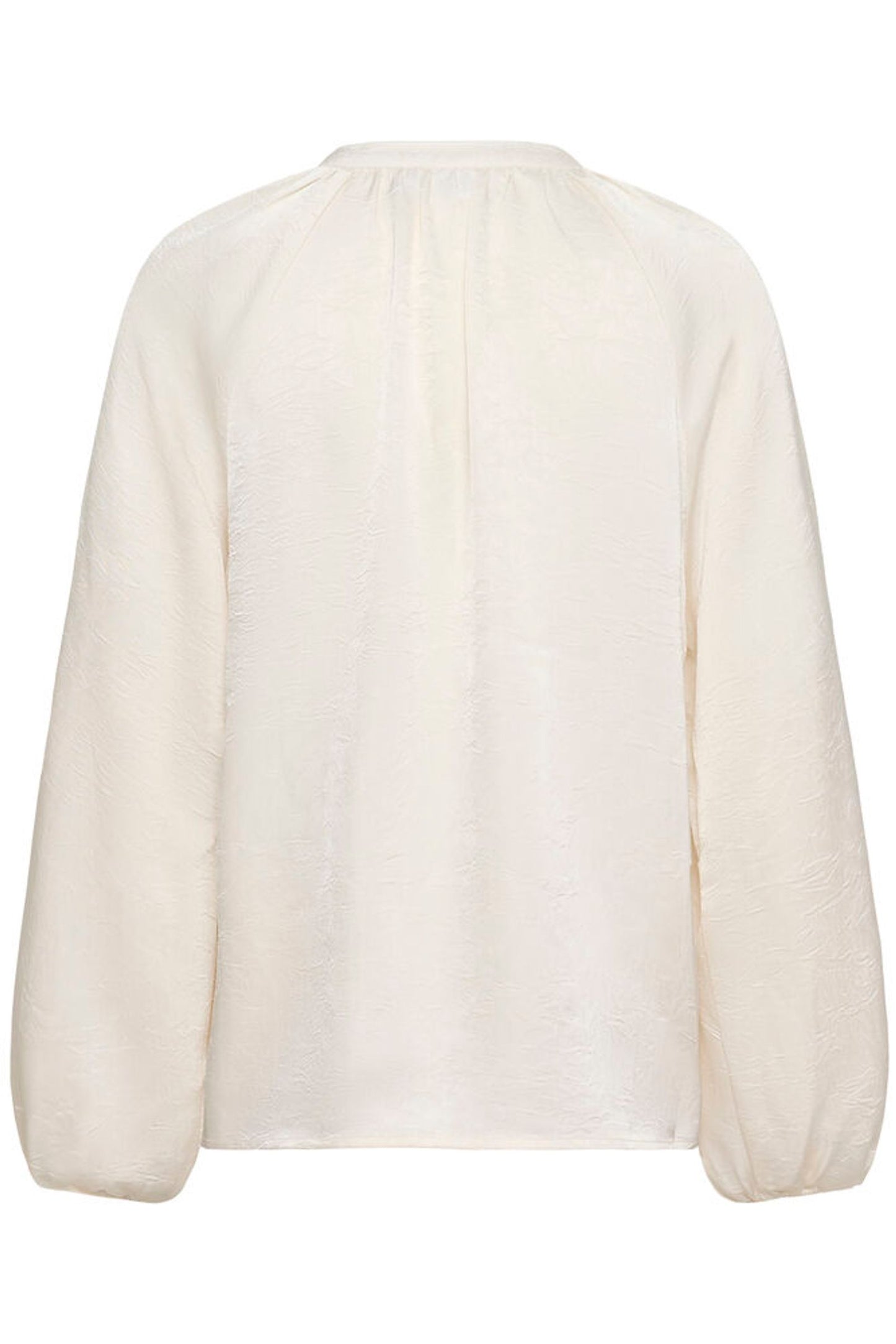 White blouse with long sleeves on a white background
