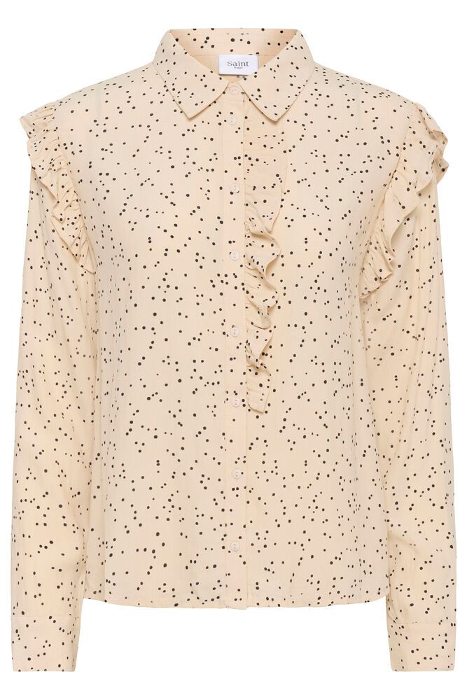 Beige blouse with black speckle pattern on a white background