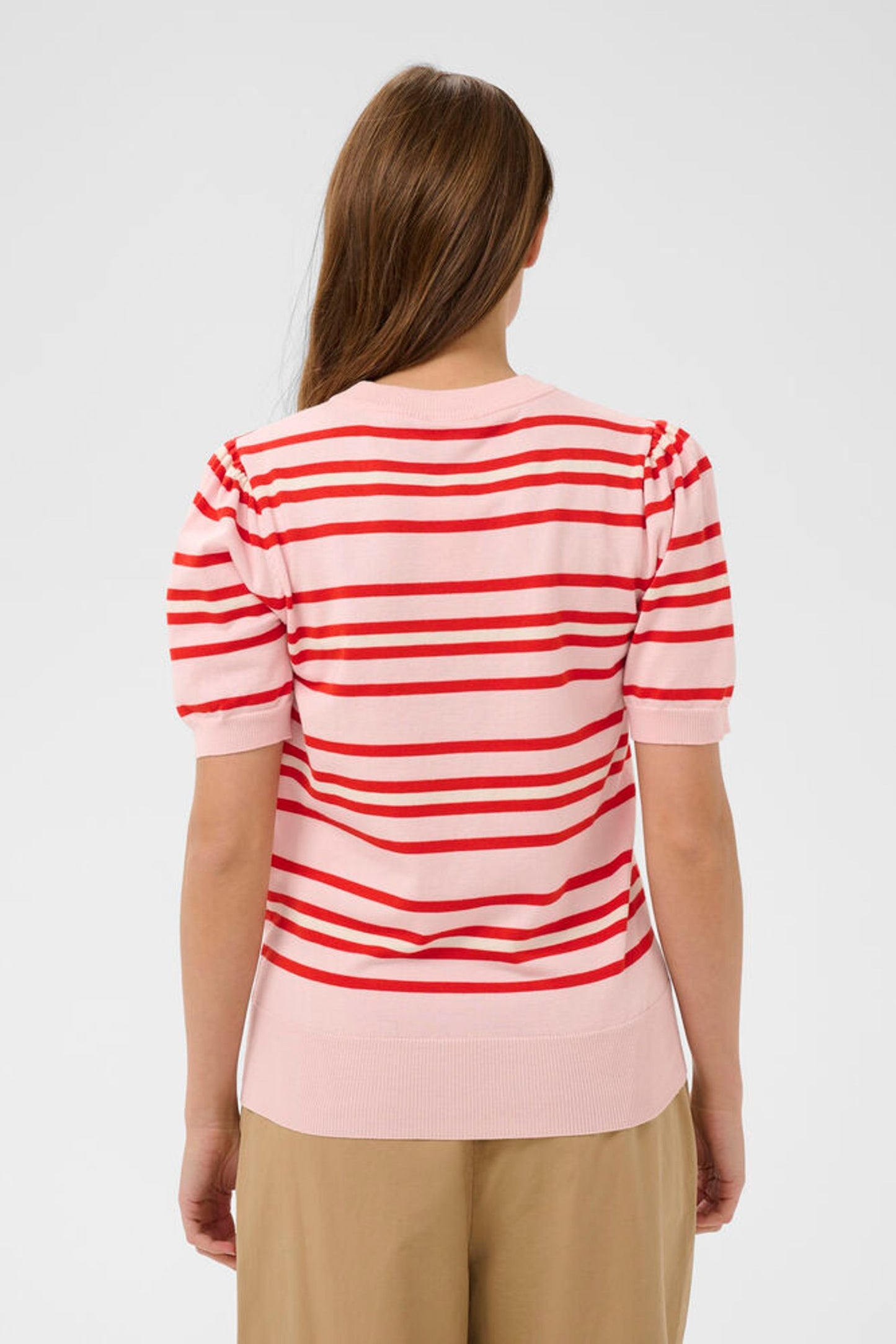 Back view of pink short sleeve jumper with red stripes
