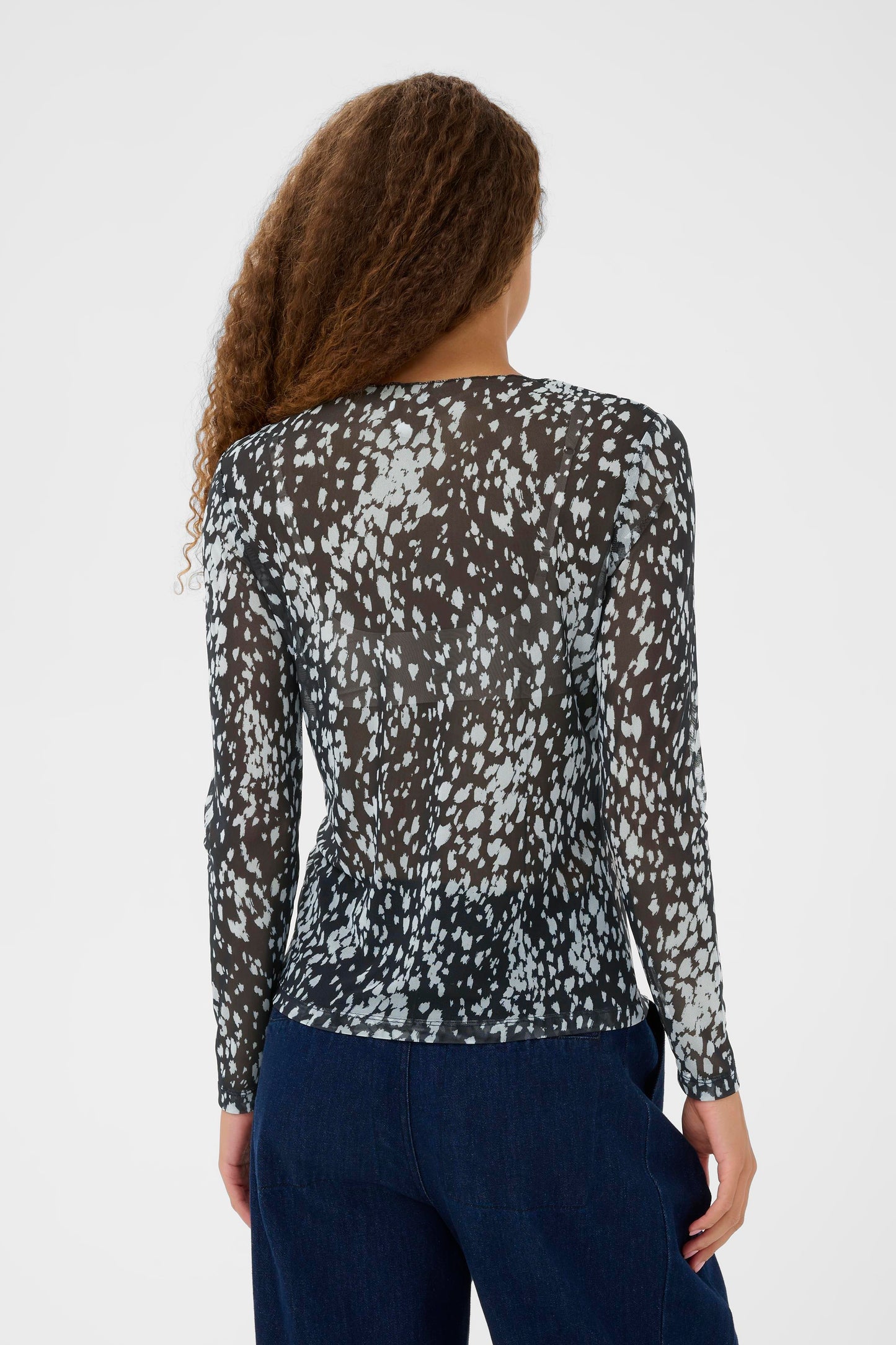 back view of sheer blouse