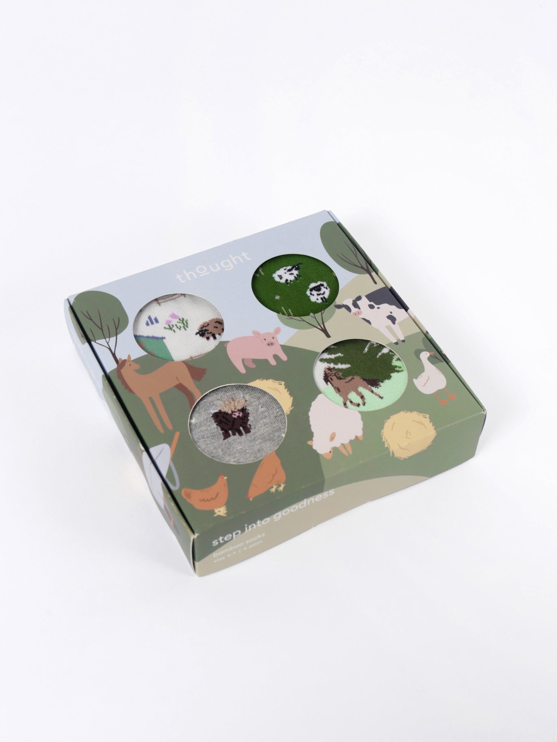 Box of animal-themed socks with a white background