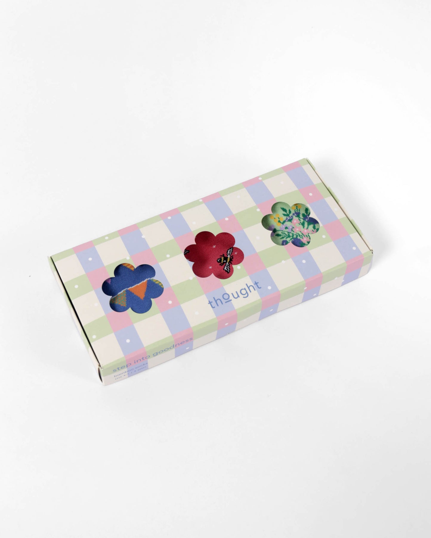 Box with colorful flower designs on a checkered pattern