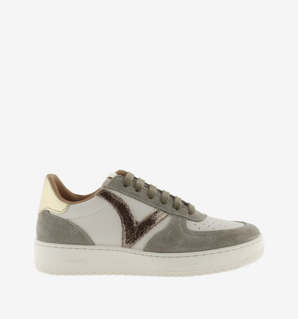 Sneaker with gray and white design on a white background