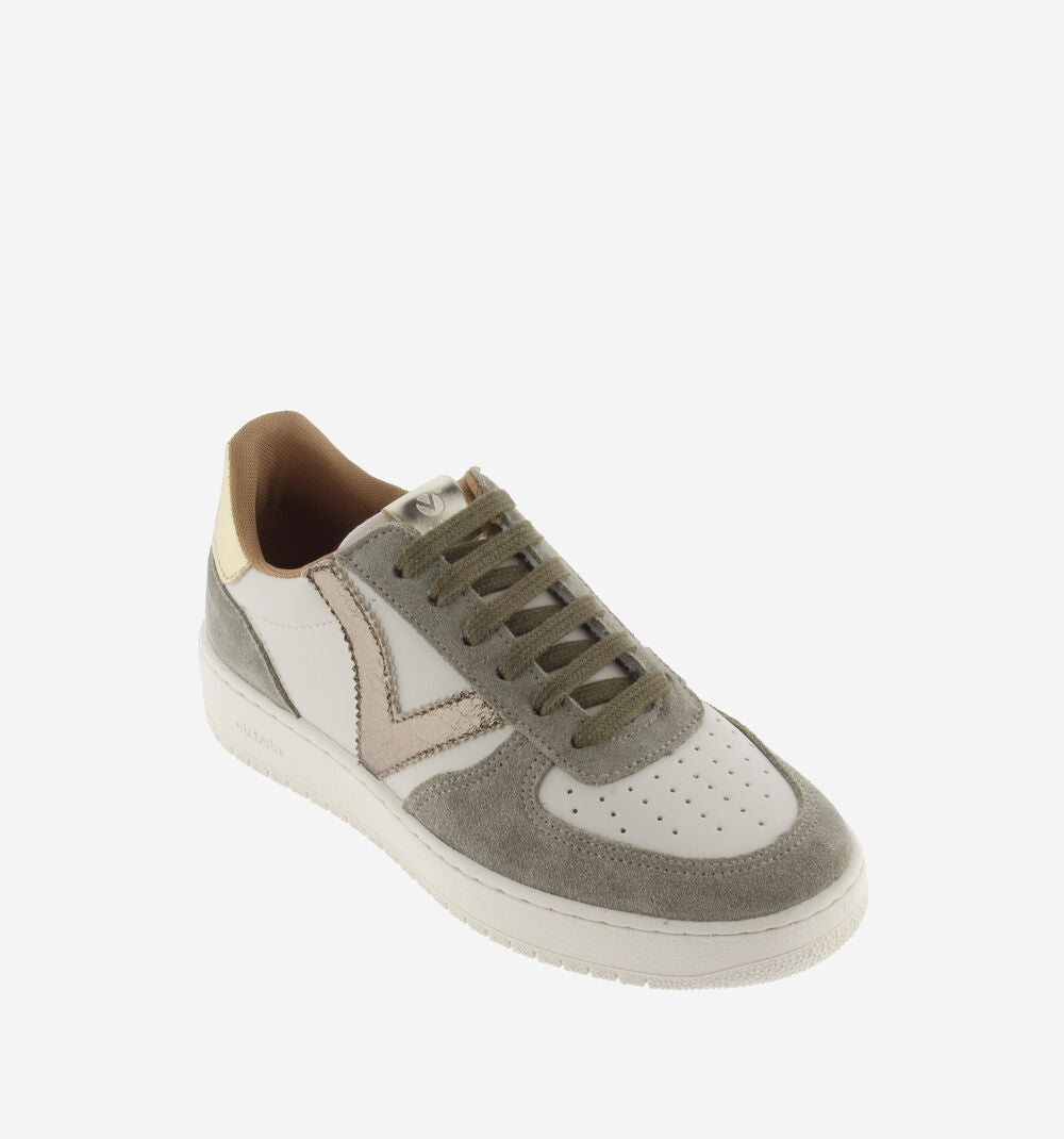 Sneaker with gray and white design on a white background
