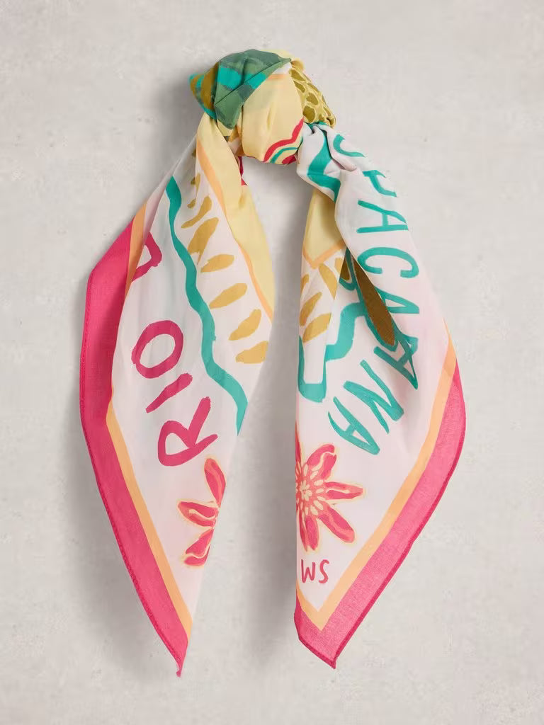 Colorful scarf with floral and text design on a light gray background