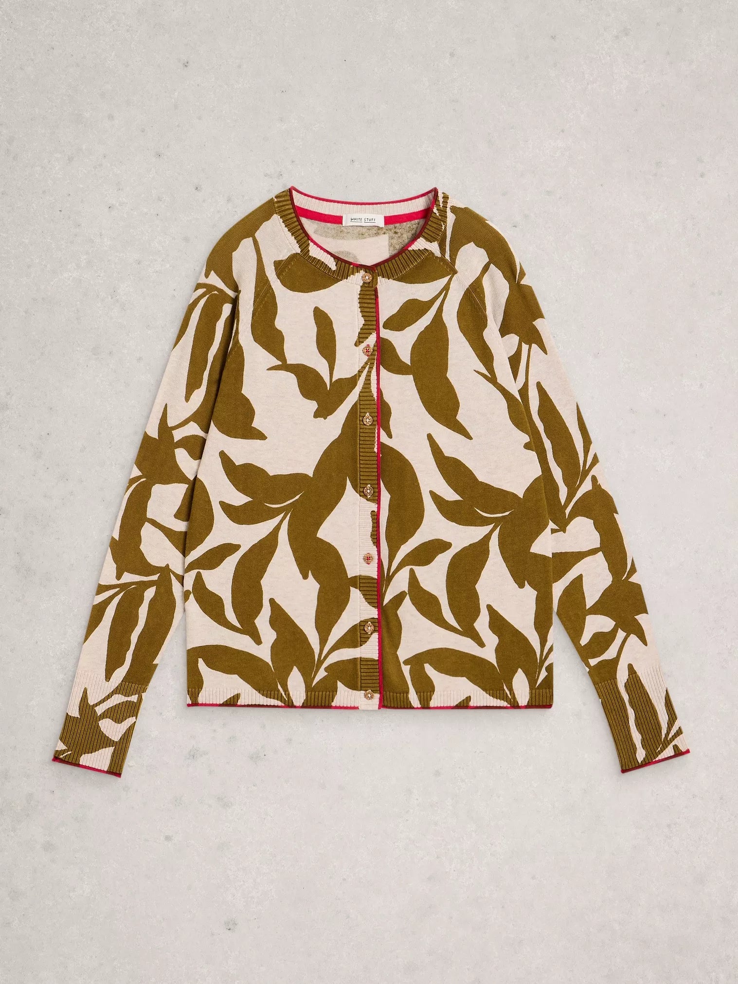 Cardigan with leaf pattern on a light gray background