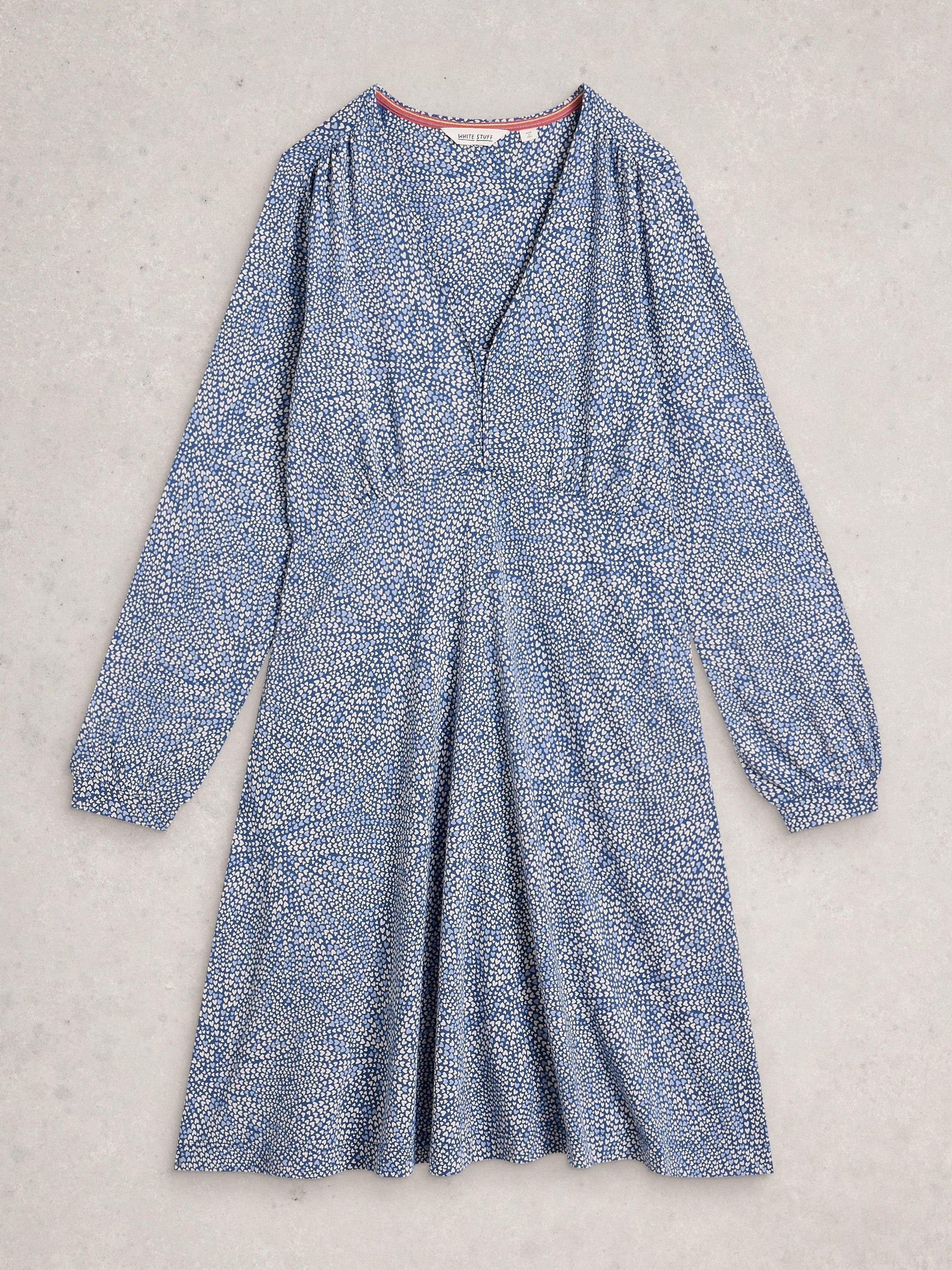Flat lay of blue and white heart print dress
