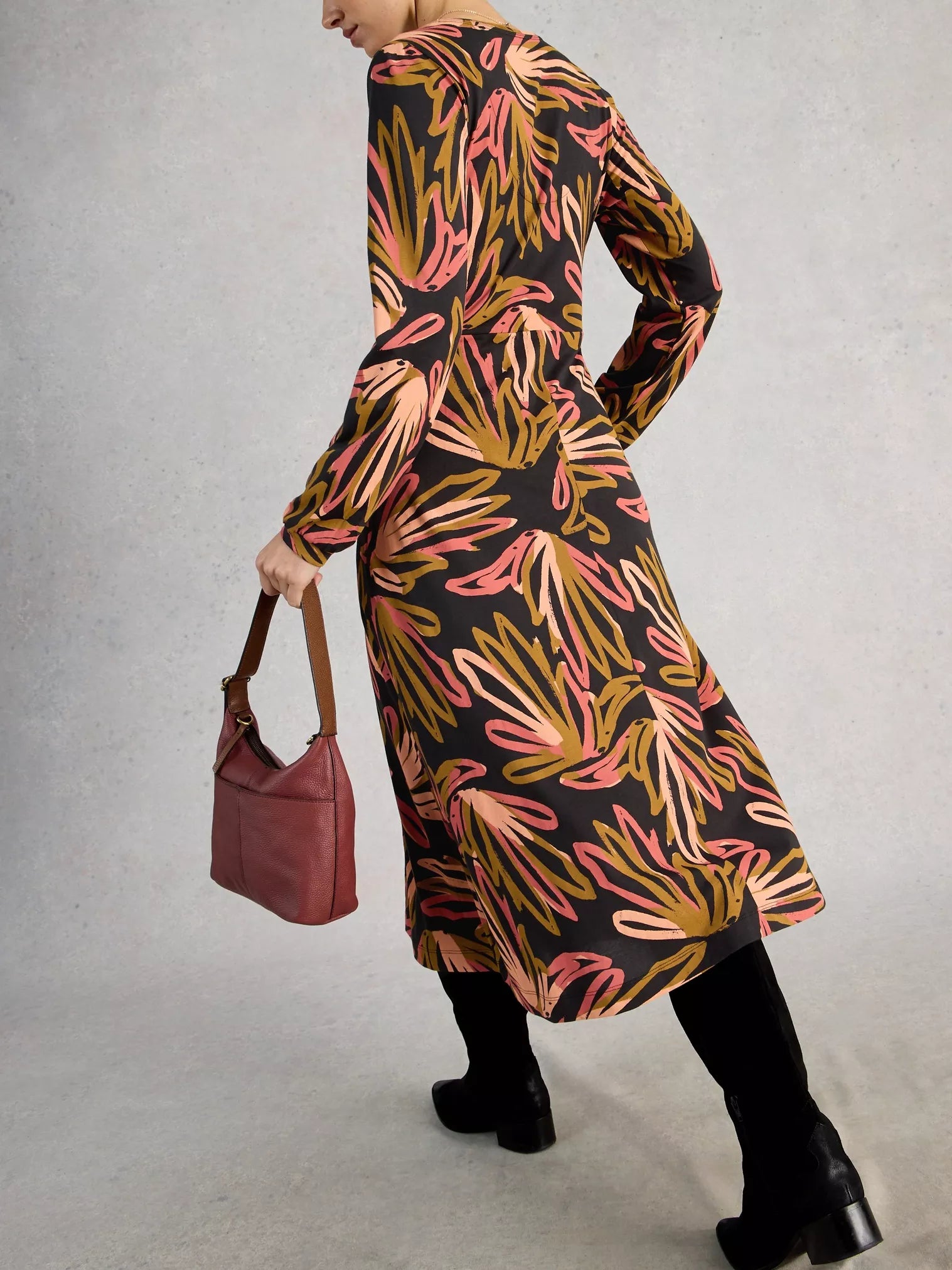 Jersey dress worn with black boots