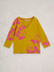 Yellow top with pink floral patterns on a light gray background