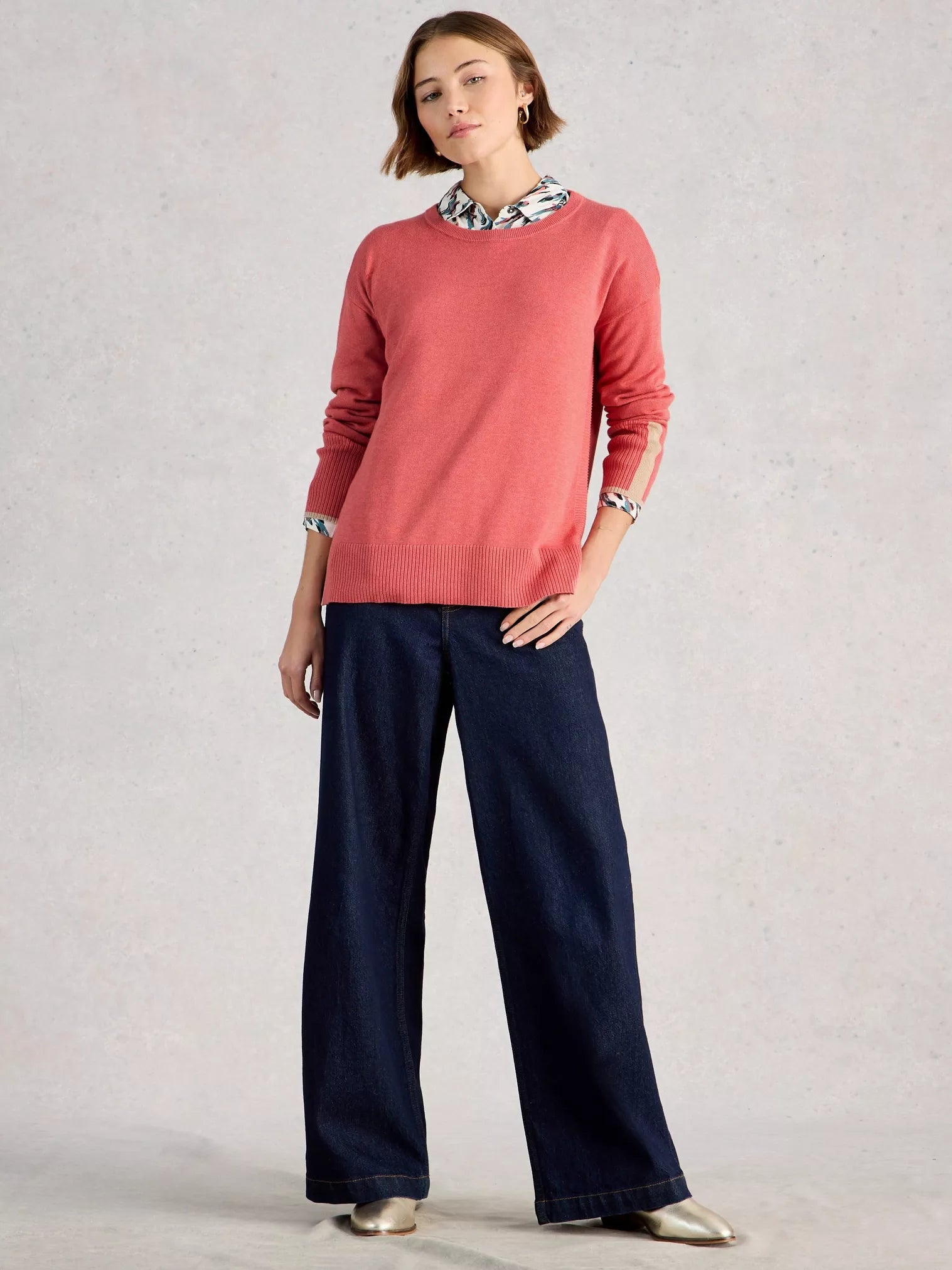 pink jumper worn with jeans